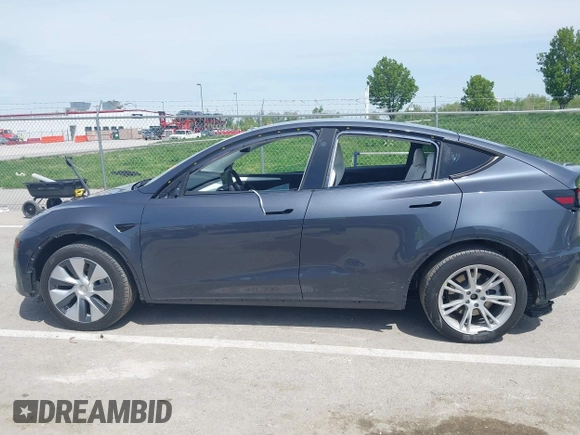 2023 Tesla Model Y Long Range z VIN 7SAYGDEE1PA158661, wystawiony jako IAAI lot #41983897 z przebiegiem 20 176 mil mil oraz . Historia ofert i sprzedaży dostępna na DreamBid. Obrazek 15.