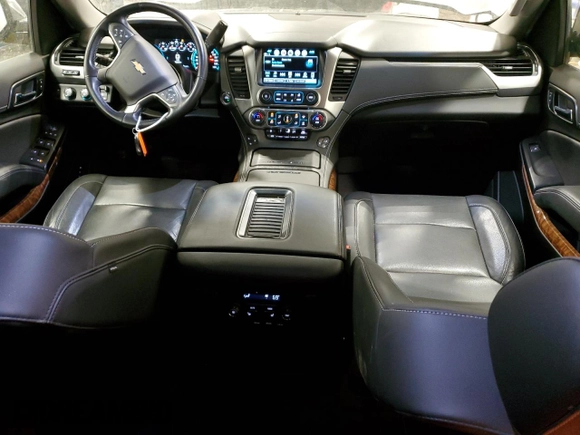 2019 Chevrolet Suburban Premier with VIN 1GNSKJKC7KR323435, listed as a Copart auction lot 43595885 with 79,813 mi miles and Salvage Title. Bid and sale history available at DreamBid. Image 8.