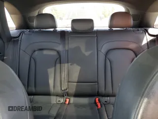 2018 Audi Q3 Premium Plus z VIN WA1JCCFSXJR027087, wystawiony jako Copart lot #58527985 z przebiegiem 99 372 mil mil oraz Szkoda całkowita • Salvage title. Historia ofert i sprzedaży dostępna na DreamBid. Obrazek 10.