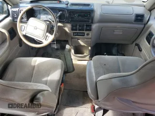 1994 Plymouth Voyager z VIN 2P4GH2537RR795200, wystawiony jako Copart lot #80207464 z przebiegiem 212 208 mil mil oraz Szkody całkowita. Historia ofert i sprzedaży dostępna na DreamBid. Obrazek 8.