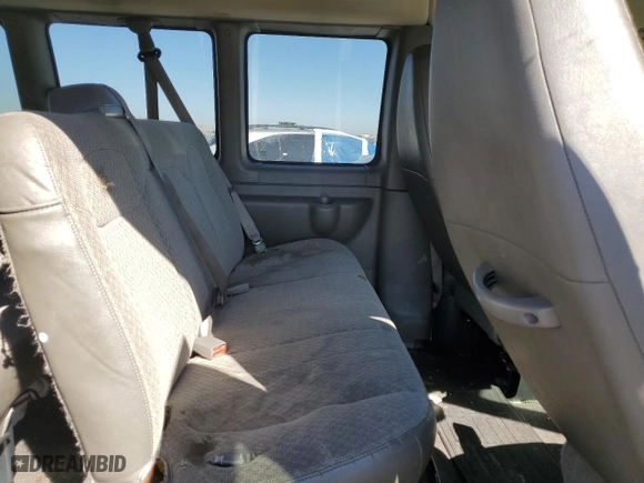 2012 Chevrolet Express Passenger 1LT with VIN 1GAZG1FG4C1100252, listed as a Copart auction lot 73242444 with 76,779 mi miles and Salvage Title. Bid and sale history available at carsss.com. Image 11.