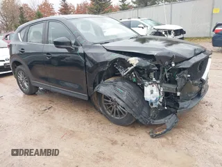 2017 Mazda CX-5 Sport with VIN JM3KFBBL5H0201857, listed as a IAAI auction lot 40885161 with 87,464 mi miles. Bid and sale history available at carsss.com. Image 1.