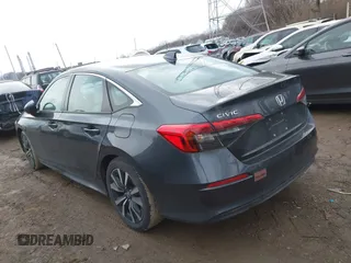 2023 Honda Civic Sedan EX with VIN 2HGFE1F70PH305477, listed as a IAAI auction lot 41058060 with 46,761 mi miles. Bid and sale history available at carsss.com. Image 3.