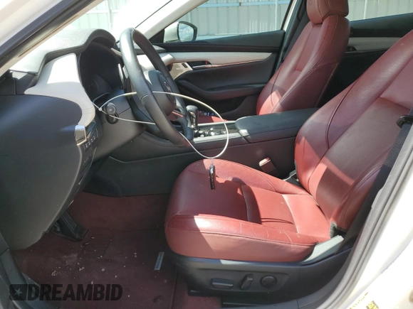 2021 Mazda 3 2.5 Turbo with VIN JM1BPBAY5M1308950, listed as a Copart auction lot 87502495 with 62,843 mi miles and Salvage Title. Bid and sale history available at DreamBid. Image 7.