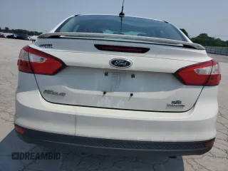 2012 Ford Focus SE z VIN 1FAHP3F24CL427067, wystawiony jako Copart lot #60402005 z przebiegiem 141 810 mil mil oraz Czysty tytuł • Clean title. Historia ofert i sprzedaży dostępna na DreamBid. Obrazek 6.
