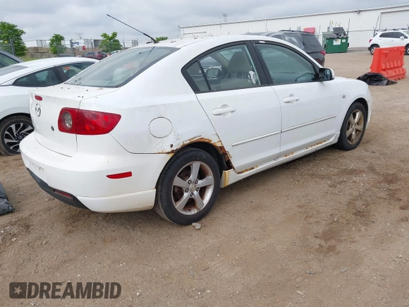 2006 Mazda 3 i Touring with VIN JM1BK32F161401419, listed as a IAAI auction lot 42261618 with 96,772 mi miles and . Bid and sale history available at DreamBid. Image 4.