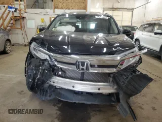 2019 Honda Pilot Touring 7-Passenger with VIN 5FNYF6H65KB092806, listed as a Copart auction lot 54205085 with 130,219 mi miles and Salvage title. Bid and sale history available at DreamBid. Image 5.