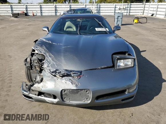 2003 Chevrolet Corvette with VIN 1G1YY22G435133247, listed as a Copart auction lot 85730074 with 115,143 mi miles and Salvage Title. Bid and sale history available at carsss.com. Image 5.