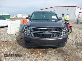 2015 Chevrolet Suburban LT with VIN 1GNSKJKC8FR717435, listed as a IAAI auction lot 41313726 with 120,731 mi miles and . Bid and sale history available at DreamBid. Image 12.
