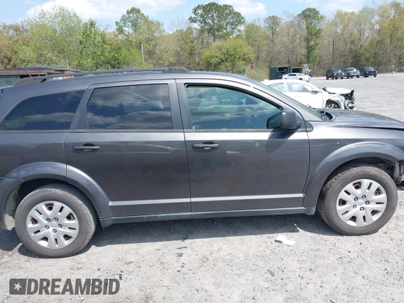 2017 Dodge Journey SE with VIN 3C4PDCABXHT538885, listed as a IAAI auction lot 41919599 with 170,311 mi miles and . Bid and sale history available at DreamBid. Image 13.