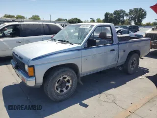 1987 Nissan Hardbody E z VIN JN6ND11S1HW030629, wystawiony jako Copart lot #65657004 z przebiegiem 181 228 mil mil oraz Szkody całkowita. Historia ofert i sprzedaży dostępna na DreamBid. Obrazek 1.