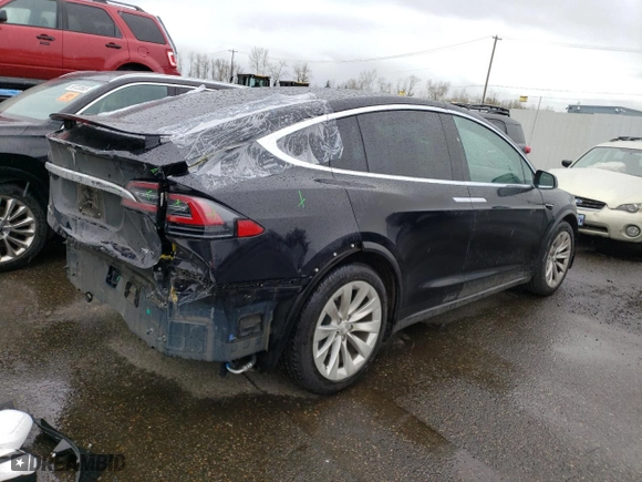 2018 Tesla Model X 75D with VIN 5YJXCBE20JF119875, listed as a Copart auction lot 50772175 with 48,805 mi miles and Salvage Title. Bid and sale history available at carsss.com. Image 3.