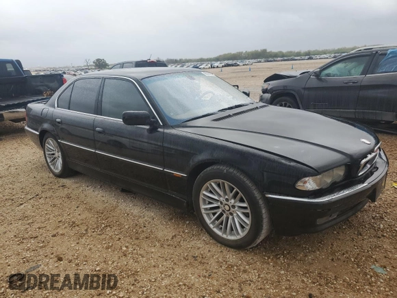 2000 BMW 7 Series 740i with VIN WBAGG8342YDN79307, listed as a Copart auction lot 80962694 with 166,520 mi miles and Clean title. Bid and sale history available at DreamBid. Image 4.