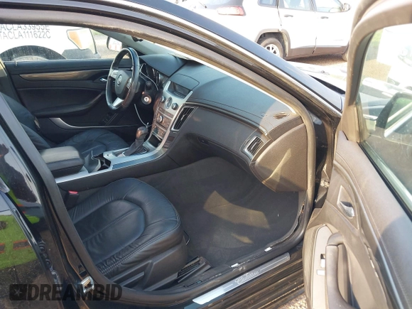 2012 Cadillac CTS with VIN 1G6DA5E55C0115278, listed as a IAAI auction lot 41953406 with 124,441 mi miles and . Bid and sale history available at DreamBid. Image 5.