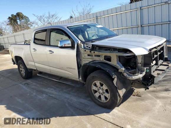2015 GMC Canyon 2WD with VIN 1GTG5AE38F1156671, listed as a Copart auction lot 85194924 with 123,597 mi miles and Salvage Title. Bid and sale history available at DreamBid. Image 4.