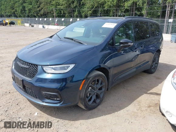 2023 Chrysler Pacifica Limited with VIN 2C4RC3GGXPR555282, listed as a IAAI auction lot 42452848 with 18,373 mi miles and . Bid and sale history available at DreamBid. Image 18.