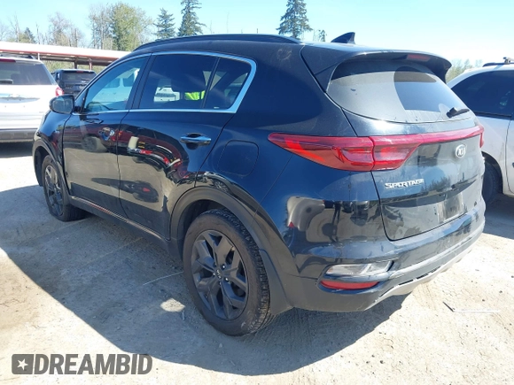 2020 Kia Sportage S with VIN KNDP6CAC0L7723110, listed as a IAAI auction lot 42077872 with 70,821 mi miles. Bid and sale history available at carsss.com. Image 3.