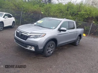 2020 Honda Ridgeline RTL-E with VIN 5FPYK3F73LB004365, listed as a IAAI auction lot 41965887 with 80,981 mi miles and . Bid and sale history available at DreamBid. Image 19.