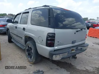 2005 Chevrolet Tahoe LT with VIN 1GNEC13T45J212286, listed as a IAAI auction lot 42704610 with 195,479 mi miles and . Bid and sale history available at DreamBid. Image 3.
