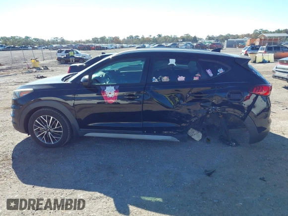 2019 Hyundai Tucson Sport with VIN KM8J33AL5KU902933, listed as a IAAI auction lot 41286316 with 73,799 mi miles. Bid and sale history available at carsss.com. Image 15.