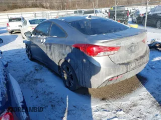 2013 Hyundai Elantra Coupe SE with VIN KMHDH6AE8DU009840, listed as a IAAI auction lot 41409231 with 176,445 mi miles. Bid and sale history available at carsss.com. Image 3.