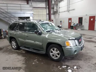 2004 GMC Envoy SLE with VIN 1GKDT13S842295715, listed as a IAAI auction lot 41602246 with 162,119 mi miles. Bid and sale history available at carsss.com. Image 1.