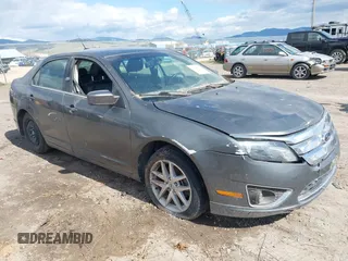 2012 Ford Fusion SEL z VIN 3FAHP0JA1CR125685, wystawiony jako IAAI lot #42140974 z przebiegiem 116 278 mil mil oraz . Historia ofert i sprzedaży dostępna na DreamBid. Obrazek 1.