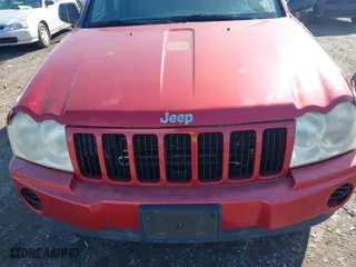 2006 Jeep Grand Cherokee Laredo with VIN 1J4GR48KX6C128491, listed as a IAAI auction lot 41949301 with 183,791 mi miles. Bid and sale history available at carsss.com. Image 6.