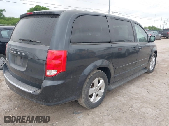 2013 Dodge Grand Caravan SE with VIN 2C4RDGBG0DR641272, listed as a IAAI auction lot 42046978 with 159,342 mi miles and . Bid and sale history available at DreamBid. Image 4.
