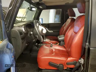 2013 Jeep Wrangler Rubicon with VIN 1C4HJWCG6DL666540, listed as a Copart auction lot 79337404 with 130,448 mi miles and Salvage title. Bid and sale history available at DreamBid. Image 7.