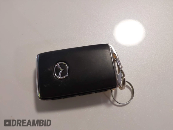 2021 Mazda 6 Carbon Edition with VIN JM1GL1WY9M1614117, listed as a IAAI auction lot 41305576 with 54,670 mi miles and . Bid and sale history available at DreamBid. Image 11.