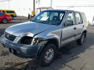 2000 Honda CR-V LX with VIN JHLRD184XYC054038, listed as a IAAI auction lot 41414445 with 294,210 mi miles. Bid and sale history available at carsss.com. Image 17.