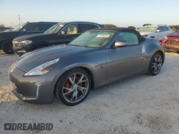 2014 Nissan 370Z Touring with VIN JN1AZ4FH4EM620092, listed as a Copart auction lot 77439254 with 38,662 mi miles and Salvage Title. Bid and sale history available at DreamBid. Image 1.