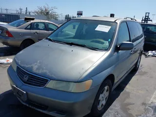 2001 Honda Odyssey EX z VIN 2HKRL18641H504729, wystawiony jako IAAI lot #42337944 z przebiegiem 203 356 mil mil oraz . Historia ofert i sprzedaży dostępna na DreamBid. Obrazek 2.