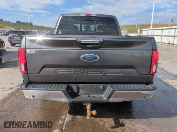 2019 Ford F-150 XL with VIN 1FTEW1E53KFB57102, listed as a Copart auction lot 61633055 with 86,949 mi miles and Salvage title. Bid and sale history available at DreamBid. Image 6.