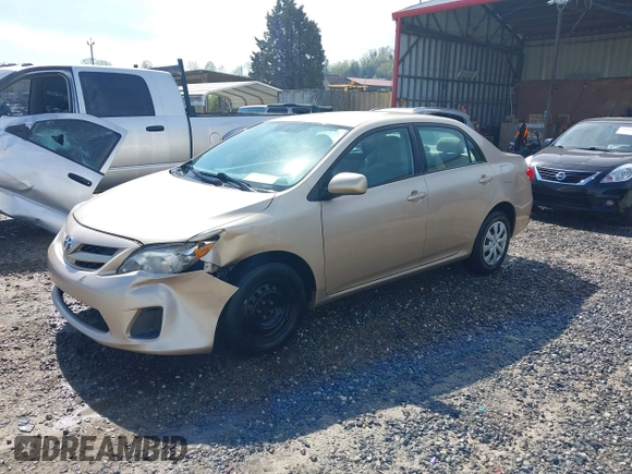 2011 Toyota Corolla L with VIN 2T1BU4EE1BC547635, listed as a IAAI auction lot 42053236 with 121,485 mi miles. Bid and sale history available at carsss.com. Image 17.