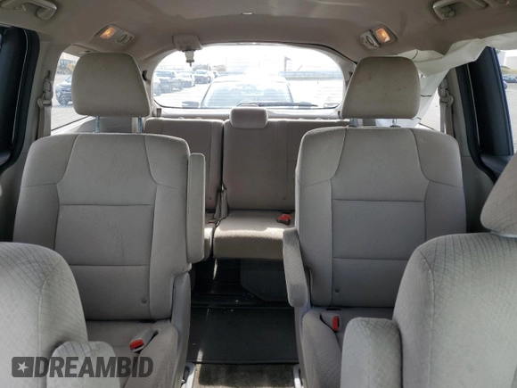 2016 Honda Odyssey LX с VIN 5FNRL5H27GB112890, выставлен на аукционе Copart как лот 57286785 с пробегом 103 508 миль миль и Списание • Salvage title. История ставок и продаж доступна на DreamBid. Изображение 10.