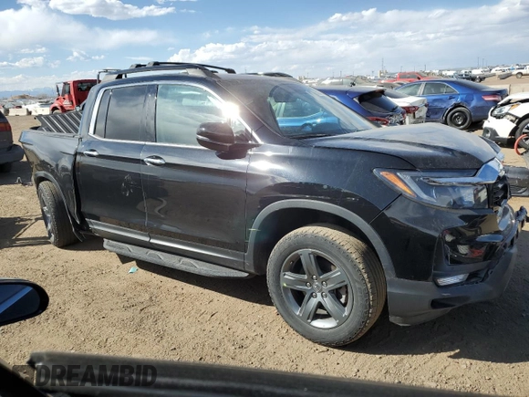 2023 Honda Ridgeline RTL-E with VIN 5FPYK3F71PB024149, listed as a Copart auction lot 50767465 with 40,943 mi miles and Salvage title. Bid and sale history available at DreamBid. Image 4.