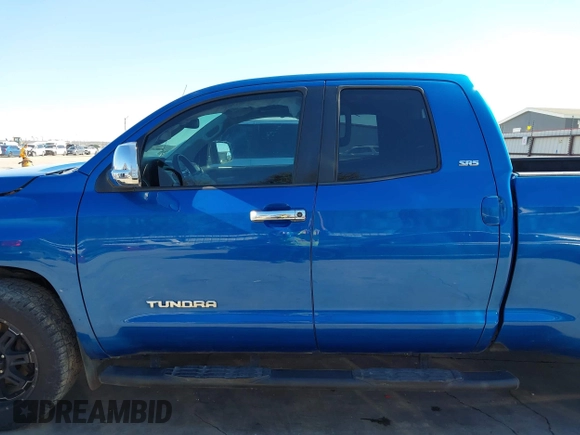 2016 Toyota Tundra SR z VIN 5TFRM5F13GX095535, wystawiony jako IAAI lot #41618316 z przebiegiem 131 386 mil mil oraz . Historia ofert i sprzedaży dostępna na DreamBid. Obrazek 15.