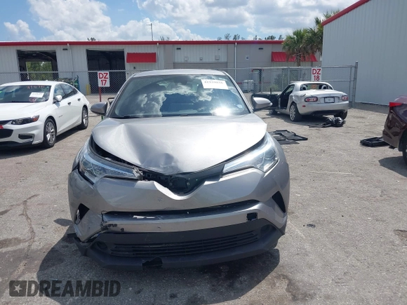 2019 Toyota C-HR XLE with VIN NMTKHMBX8KR093044, listed as a IAAI auction lot 41939036 with 60,130 mi miles. Bid and sale history available at carsss.com. Image 12.
