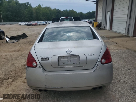 2004 Nissan Maxima SL with VIN 1N4BA41EX4C869772, listed as a Copart auction lot 69843554 with 205,409 mi miles and Salvage Title. Bid and sale history available at carsss.com. Image 6.