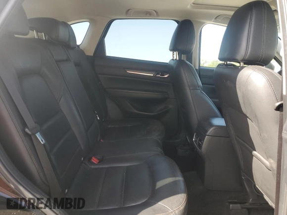 2018 Mazda CX-5 Grand Touring z VIN JM3KFBDM0J0399985, wystawiony jako Copart lot #54097665 z przebiegiem 45 344 mil mil oraz Szkoda całkowita • Salvage title. Historia ofert i sprzedaży dostępna na DreamBid. Obrazek 11.