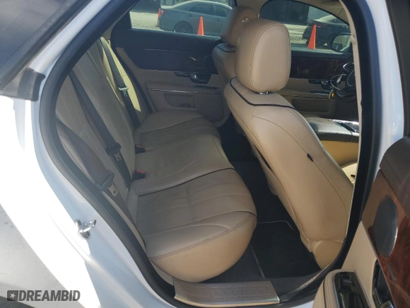 2013 Jaguar XJ with VIN SAJWJ1CD1D8V51865, listed as a Copart auction lot 44382125 with NaN miles and Salvage Title. Bid and sale history available at carsss.com. Image 10.