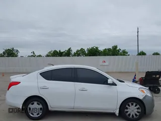 2014 Nissan Versa SV with VIN 3N1CN7AP9EL809772, listed as a IAAI auction lot 42199651 with 163,102 mi miles. Bid and sale history available at carsss.com. Image 5.