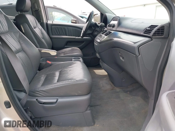 2007 Honda Odyssey EX-L z VIN 5FNRL38677B451060, wystawiony jako IAAI lot #42161554 z przebiegiem 190 147 mil mil oraz . Historia ofert i sprzedaży dostępna na DreamBid. Obrazek 5.