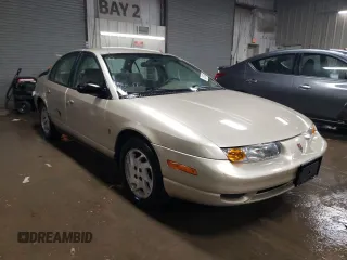2000 Saturn SL with VIN 1G8ZK5278YZ269342, listed as a Copart auction lot 82573694 with 53,641 mi miles and Salvage title. Bid and sale history available at DreamBid. Image 4.