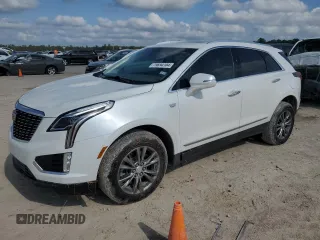 2021 Cadillac XT5 FWD Premium Luxury z VIN 1GYKNCR48MZ136597, wystawiony jako Copart lot #79694104 z przebiegiem 52 504 mil mil oraz Szkoda całkowita • Salvage title. Historia ofert i sprzedaży dostępna na DreamBid. Obrazek 1.
