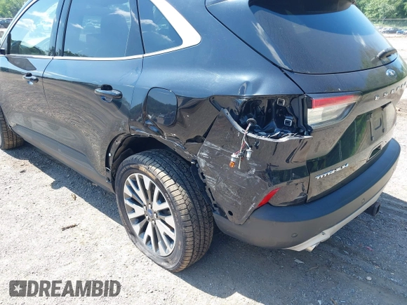 2020 Ford Escape Titanium with VIN 1FMCU9J92LUA27373, listed as a IAAI auction lot 42650077 with 42,179 mi miles and . Bid and sale history available at DreamBid. Image 18.