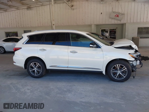 2020 Infiniti QX60 Luxe with VIN 5N1DL0MM9LC503000, listed as a IAAI auction lot 41650483 with 53,327 mi miles and . Bid and sale history available at DreamBid. Image 14.