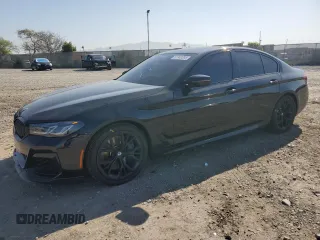 2021 BMW 5 Series M550i xDrive with VIN WBA13BK06MCF71369, listed as a Copart auction lot 51940095 with 48,344 mi miles and Salvage title. Bid and sale history available at DreamBid. Image 1.